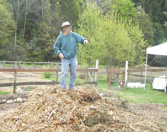 Gary Oppenheimer, who was chairman of the West Milford Community Garden in 2009, addresses those with plots in the garden.