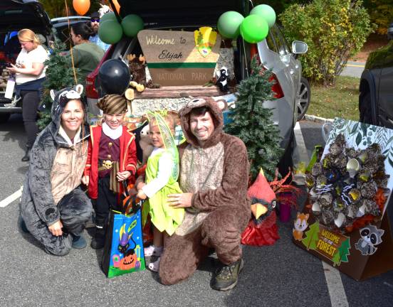 UGL Clubhouse hosts trunk or treat From left, Alexis, Lincoln, Carter and Jared Sarnowski are shown in front of their trunk.