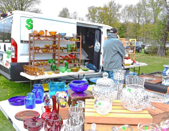 Antiques fair attracts 1,000 Glassware is among the items for sale at the JC’s Vintage & Antique Market Fair on Sunday, April 27 at the Wallisch Homestead. (Photos by Fred Ashplant)