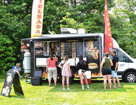 Crowd enjoys food, music, fun Kielbasa-N-More sells Polish food at the event.