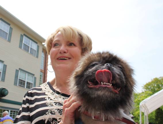 Goin' to the dogs With owner Jeanette Everett, Gizmo gave a great big smile for the camera.
