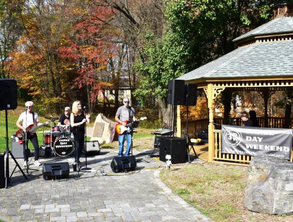 Three Day Weekend entertained at the event. From left are Frank Pensa on bass, Mark Halatin on drums, Lori Hoogmoed on lead vocals, George Tobjy on lead guitar and Lloyd Sarakin on keyboards.