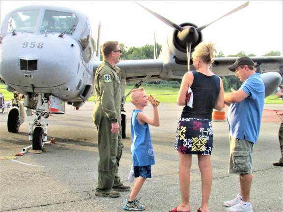 Visitors at the 2016 Greenwood Lake Air Show hear details from Dr. Joseph Masessa (right) about his antique Grumman Mohawk OV-1. Dr. Masessa died Nov. 1 when his vintage plane crashed shortly after takeoff during an air show in Stuart, Florida.