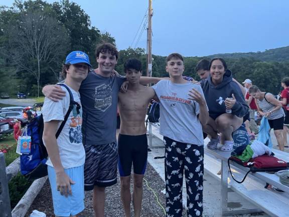 High Crest Hurricanes win league title From left, Coach Tyler Roer, Owen Kane, Coach Zach McKatten, Mikey DeMarco and Sam McKatten celebrate a hard-earned victory as they clinch the league title. (Photo by Jason Roer)