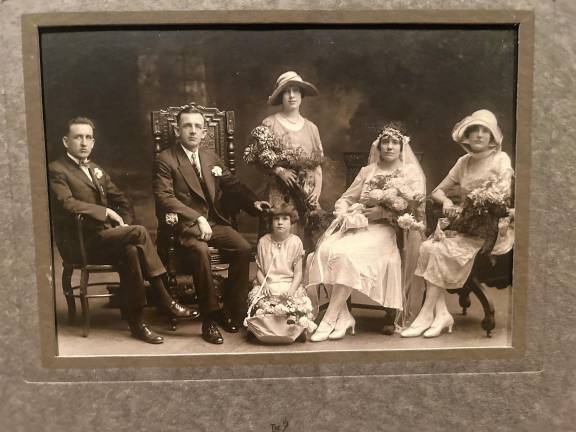 Looking back: Tintles were early Echo Lake settlers Ethel Tintle Kochka and her husband, George, on their wedding day at St. Joseph Church, Echo Lake, in the late 1920s or early 1930s. Her sisters serving as the bride’s attendants are Irene, standing; Cecelia, seated; and Marie, by a basket of flowers. (Photo provided)