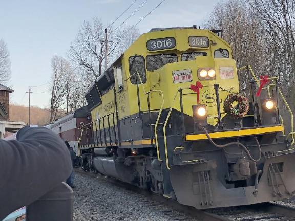 Operation Toy Train pulls into the Sparta Station to pick up donations to the Toys for Tots campaign.