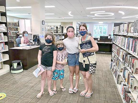 West Milford Township Library just opened its doors again to the public in early July - with some limitations. The building closed for quarantine in March, but now has begun its summer programs. Visitors to the West Milford Township Library must wear a mask or face covering and are asked to spend no more than 30 minutes in the building. Patrons can access and check out from all library collections, use the public WiFi and computers, as well as take advantage of contactless pickup for all library materials. Photo provided by Elyse Schear, Adult/Teen Services Librarian.
