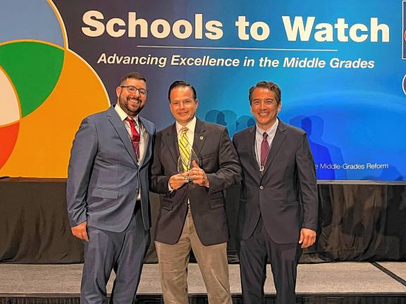 Macopin named National School to Watch From left are Thomas Santoro, a teacher at Macopin Middle School; Gregory Matlosz, principal at Macopin; and Oliver Pruksarnukul, assistant principal at Macopin. (Photo provided)