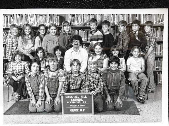 Looking back: 1980s blackout Students in Patrick Porcaro’s sixth-grade class at Marshall Hill School in 1980, in front row from left, are Warren Stephens, Billy Francis, Tyler Harrington, John Geiger and Brett Touw. In middle row, from left, are Beth Ackroyd, Nichole Alfieri, Angie Hartym, Jeanne Tregidgo, Jean Akers and Kristine Cardaci. In back row, from left, are Glen Walsh, Chris Turner, Rebecca Reinle, Debbie Cutts, Roseanne Labita, Mark Pueschel, Anthony McArthur, Mark Corbett, John Puliafico and Brian Gallagher. (Photo provided)