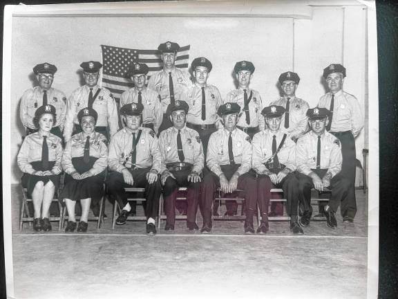 Looking back: 1st female special police officer Annie Bown, the first female special police officer in West Milford, is second from left in this early 1950 photo. Some of the other officers shown are Richard Struble, Bill Perry, Vincent Meyer, Pat Squitieri, Jim Gray and Len Spano. (File photo by Ann Genader)