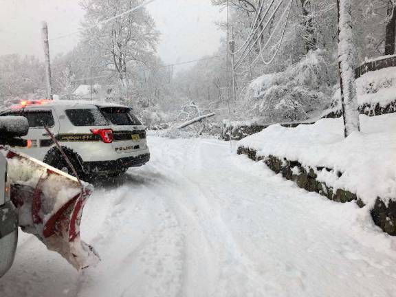 West Milford hit hard for second time in week, 21 inches of snow Rebecca Stroyer posted this picture on Facebook, of Macopin Road at High Crest Lake Wednesday, March 7.