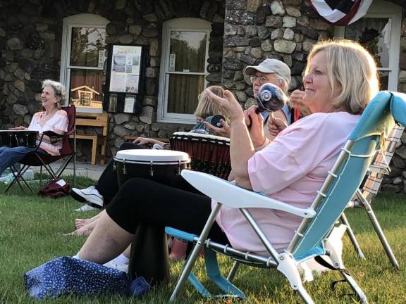 DC3 People brought things to hit and shake to the drum circle.