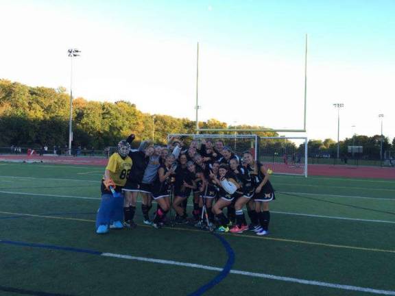 Feeling the vibe The varsity team is seen here after their 1-0 overtime win against Westwood.