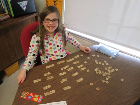 Celebrating the 100th day of school at Ringwood Christian Kara made many words with her letter tiles.