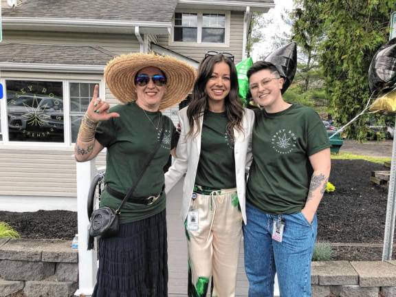 From left are Cheryl Sigretto, Rachel Lyons and Nicolle Lombardi at the official opening of the Jersey Roots cannabis dispensary. Lyons is the owner, and Sigretto and Lombardi are the managers. (Photo by Kathy Shwiff)
