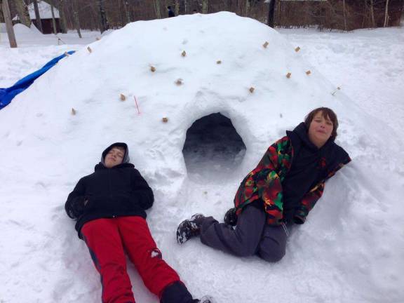 This is the sleeping quarters for Austin Baird and Bryan Szolusha. They built their quinzee, or igloo.