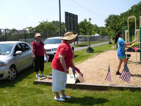 Here we go, West Milford, here we go! Getting ready to toss the rubber chicken, Jane Dell'Osso takes aim.