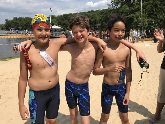 Mikey Demarco, Tyler Roer, and Zach McKatten celebrate a victory in 2018 at Glenwild Lake.