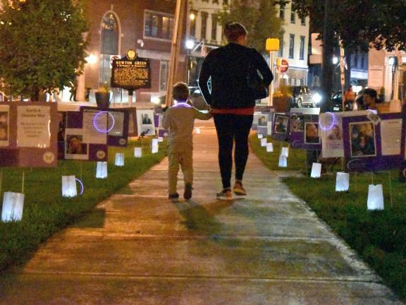 On International Overdose Awareness Day, the town square in Newton was the site of a candlelight vigil and public walk-through remembrance display of memories of lives lost to overdose. (Photo by Ryan T.)