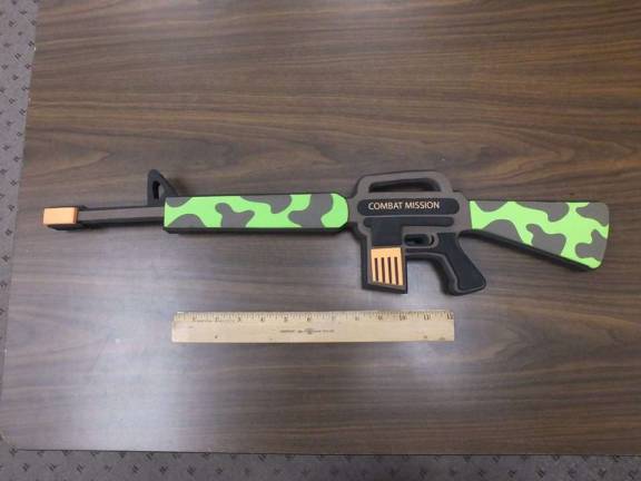 Photo courtesy of West Milford Police West Milford police say this is the toy foam gun a Macopin student posed with in a 'threatening' social media post.
