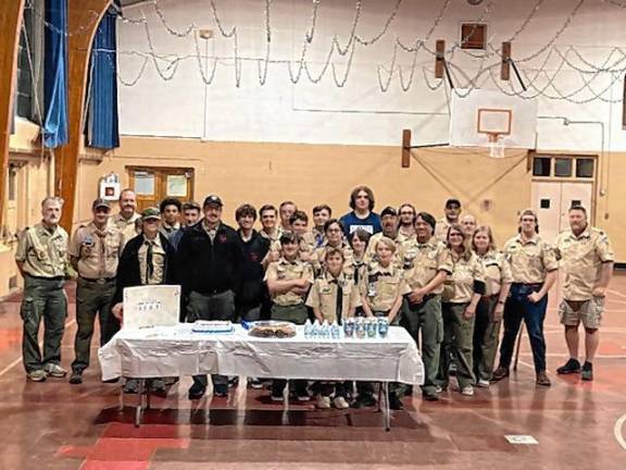 Boy Scouts Troop 159 of Hewitt celebrates Robbie Woods on April 17 before his deployment begins.