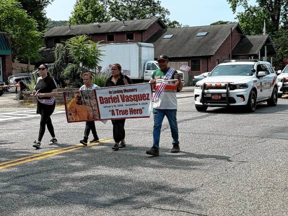 Photos: Celebrate America Parade in Greenwood Lake A tribute to Dariel Vasquez, who was killed in November by a falling tree while the 18-year-old was helping to fight a wildfire in Sterling Forest, N.Y.
