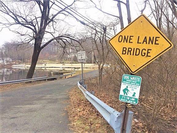 The High Crest Lake Bridge and dam, pictured on Tuesday, will be reconstructed.