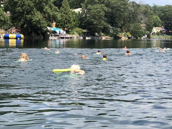 Going the distance The swimmers begin the event. (Photo by Kathy Shwiff)