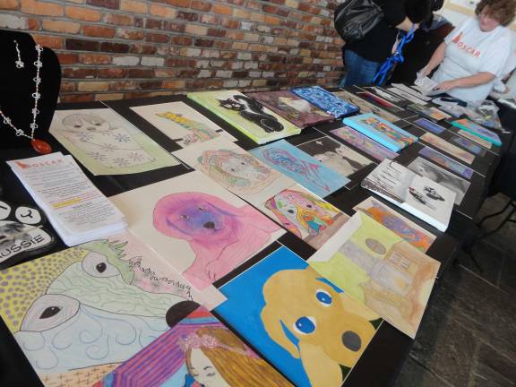 Mohawk House goes to the dogs for O.S.C.A.R. fundraiser Local students donated art to sell to raise money for O.S.C.A.R.