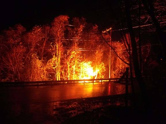 Sandy devastates New Jersey This photo, sent to us from Councilman Lou Signorino, shows a downed wire fire on Westbrook Road across from Red Barn Lane. It was one of dozens of wire fires throughout West Milford Monday night.