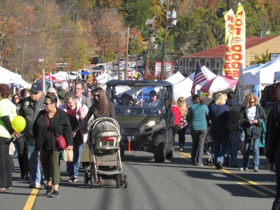 Guests walk a previous Autumn Lights Festival