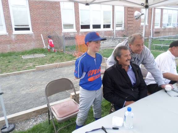 Yankees legend kicks off Little League Jason Callahan (left) and his grandfather David Savastano (right) pose with Yankees legendary pitcher Ron Guidry (center) last week at an autograph signing held at Hillcrest Field as part of opening day ceremonies for the Little League. Photo by Nathan Mayberg