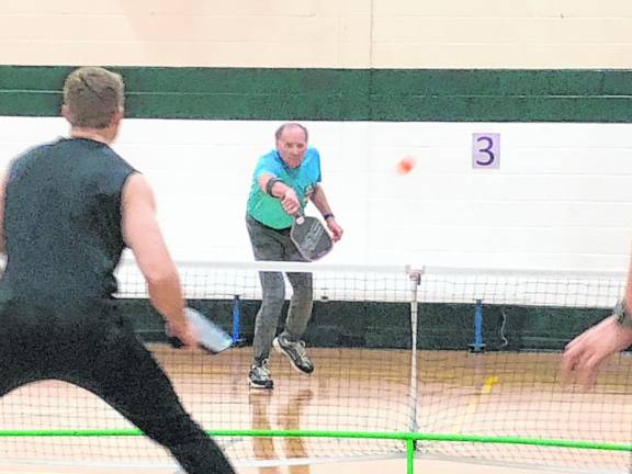 Jim Zajdel hits the pickleball. (Photo by Kathy Shwiff)