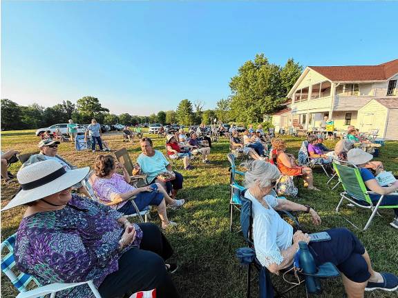 UPDATED: Free concert on Friday Residents attend a concert by Hudson’s Crossing on Monday, July 28 at Wallisch Homestead. (Photo by Denise von Wilke)