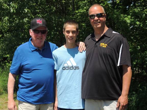 Welcome to the Bob Henry T-Ball Field Bob Henry, left, coached both Tony Licursi, left and his son, Zack. Henry has been part of the West Milford Little League for nearly 40 years.