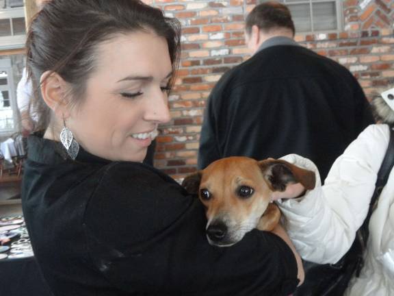 Mohawk House goes to the dogs for O.S.C.A.R. fundraiser Mohawk House employee Shannon Snure, of West Milford, takes a break with Bailey.