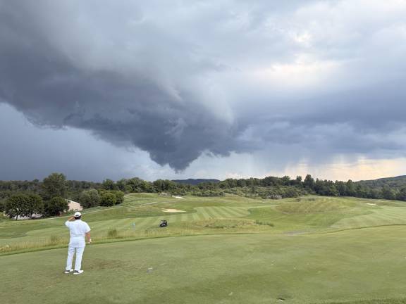 Golfer struck by lightning Ominous skies over Ballyowen Golf Club in Hamburg on Tuesday, July 8 moments before lightning strikes a golfer. (Photos by Brian Delia)