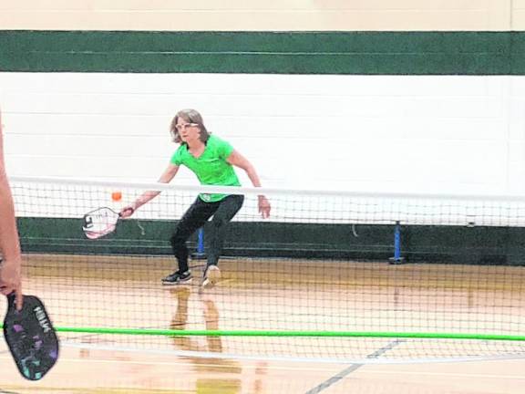 Nancy Zajdel hits the pickleball. (Photo by Kathy Shwiff)