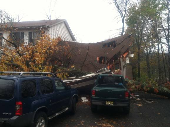 Sandy devastates New Jersey Photo by Don Webb The effects of Sandy were devastating to some homeowners, including this one on Tice Road in Hewitt.