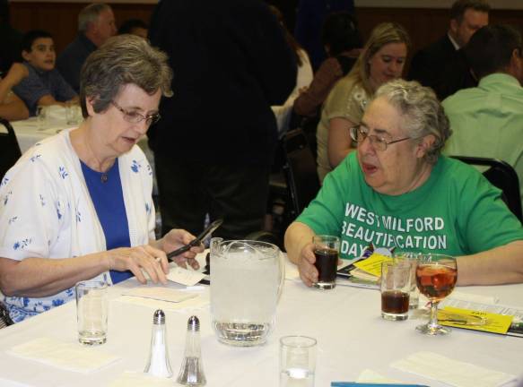 C.A.S.A. opens some eyes Marilyn Lichtenberg, left, and Doris Aaronson, members of the Health Advisory Board, attended the C.A.S.A. dinner.
