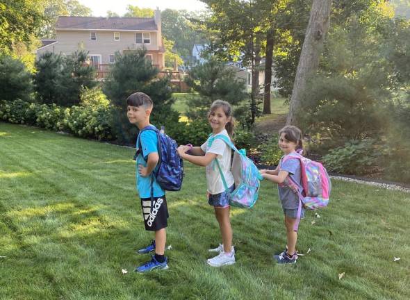 First day of school in West Milford Daniel, Ilona and Evelyn line up on their first day of fifth, third and first grade, respectively.