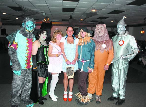 Elks Halloween dance is a real scream The Wizard of Oz was well represented at the party; Greg Minadeo (monkey), Catherine Spencer (wicked witch), Karen DeMauex (good witch), Lisa Mitchell (Dorothy), Robin Zampese (scarecrow), Tom Ferreri (lion) and John Mitchell (tin man).