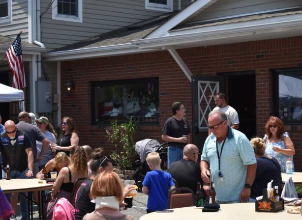 Annual Street Festival draws crowd Murphy’s restaurant had a grill cooking and tables set up outside.