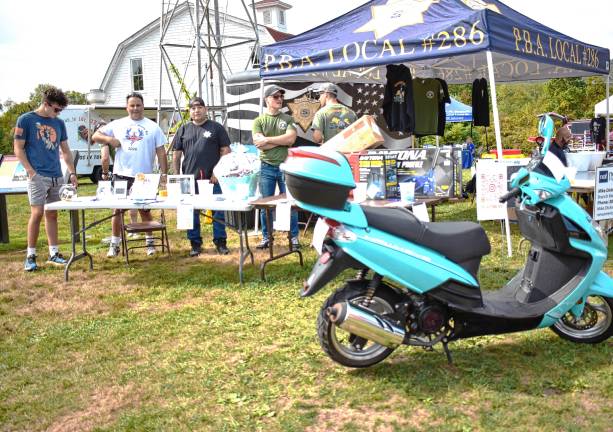 Car show attracts 400 The event organizer, Passaic County Police Benevolent Association 286, sells raffle tickets.