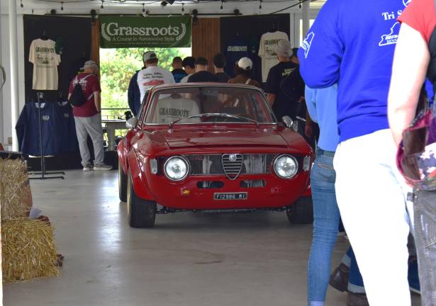 Friends of Wallisch Homestead host car show A long line into the dairy barn for merchandise.