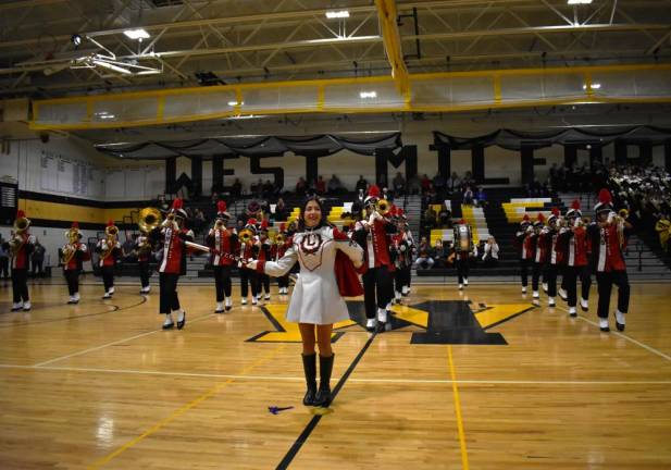 The Clifton High School marching band performs.