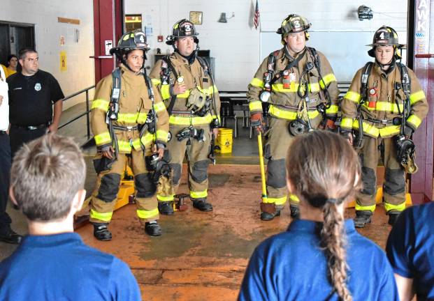 Junior Police Academy grows Firefighters speak to West Milford Junior Police Academy cadets. From left are Maritza Melendez, Bob Lamb, Will Weaver and Tyler Barker.