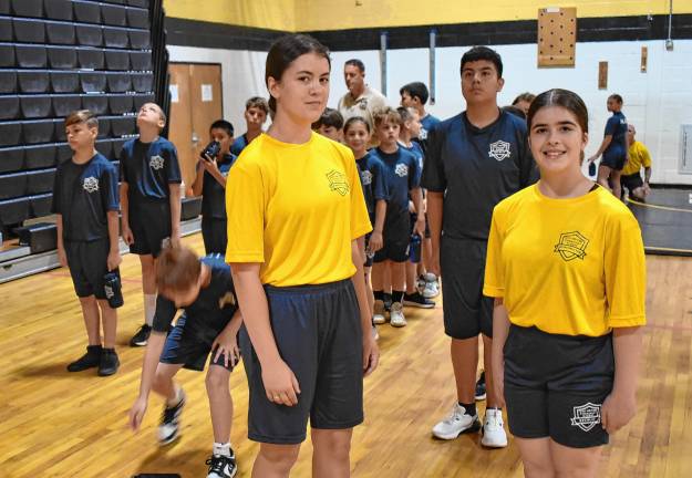 Junior Police Academy grows Alesandrea Warren, left, and Zoe Manger, both incoming high school freshmen, are instructors this year. They were cadets last year.
