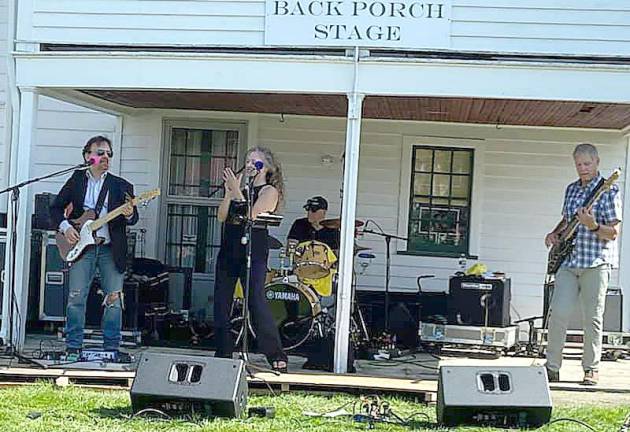 Six acts performed one after the other, rotating between the Back Porch Stage and the Stone House Stage.