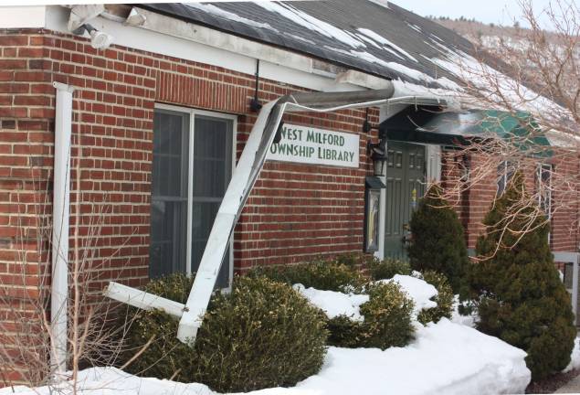 Tragedy hits again for councilwoman Photo by Ginny Raue The gutters on the libray couldn't hold the weight of the snow and ice.